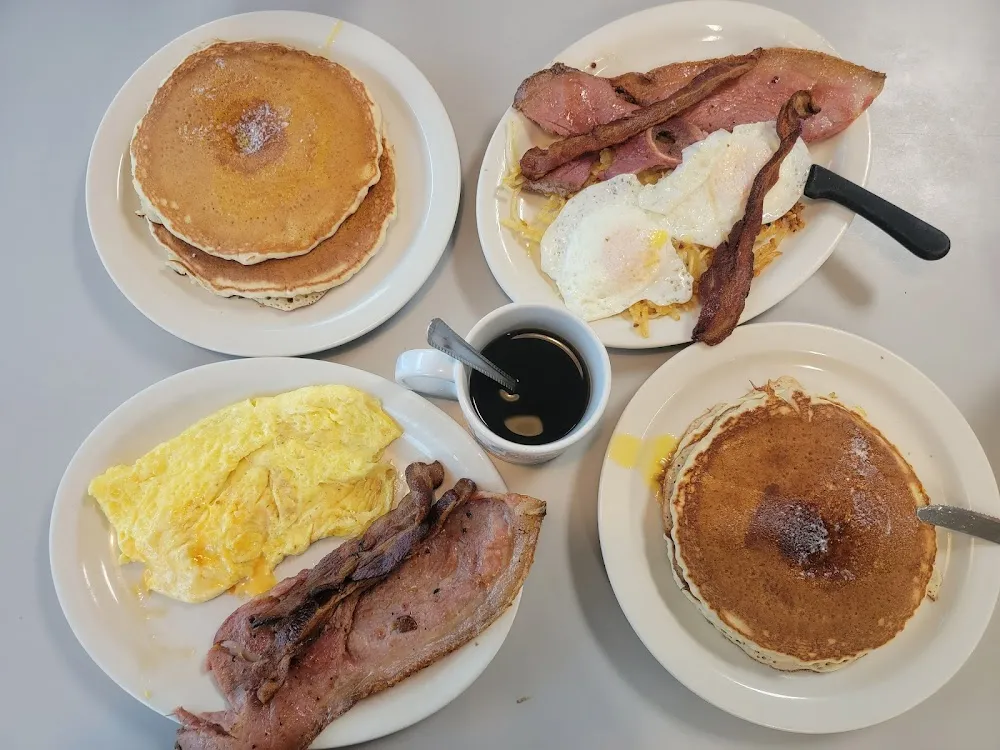 Blueberry Pancakes Cheesy Scrambled Eggs and Bacon